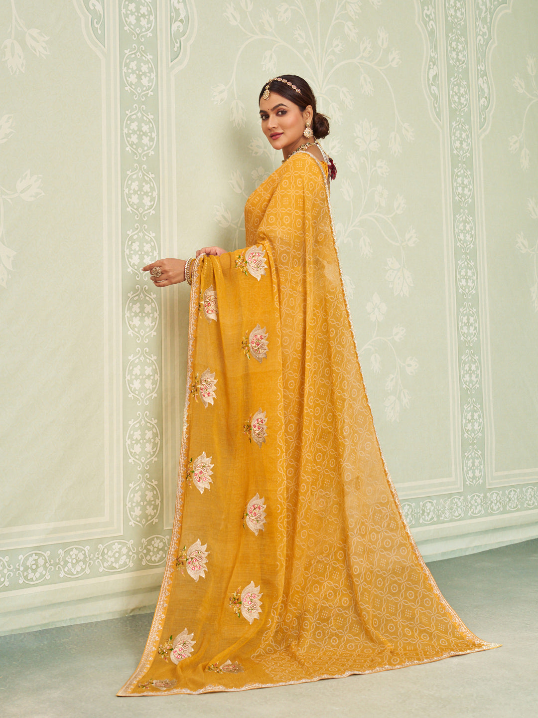 Yellow embroidered chiffon saree casual wear