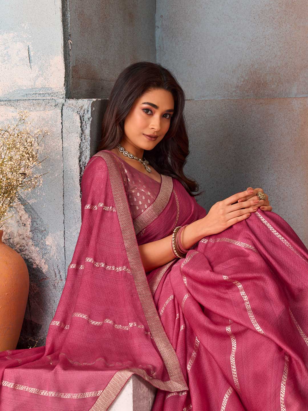 Pink woven striped silk blend saree festive wear