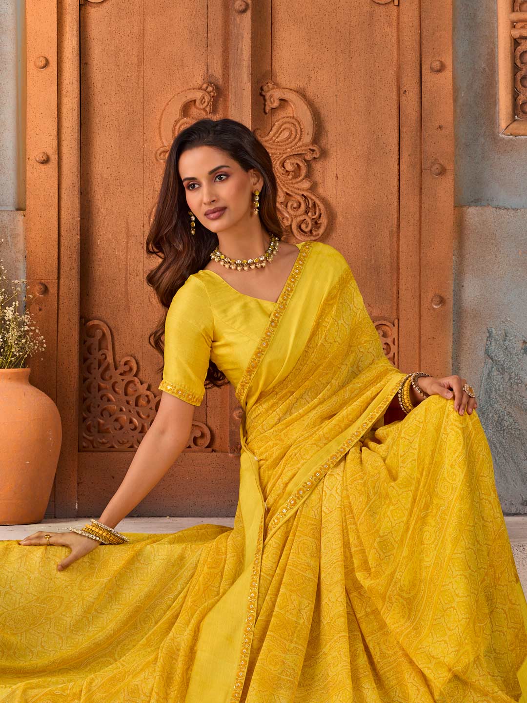 Yellow floral embroidered georgette saree wedding wear