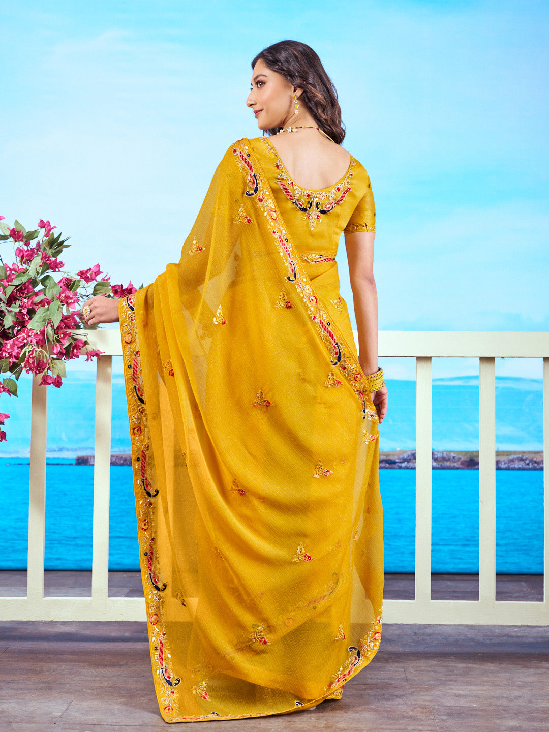 Yellow embroidered chiffon saree haldi wear