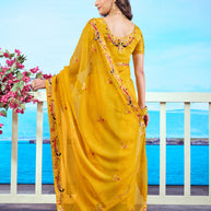 Yellow embroidered chiffon saree haldi wear