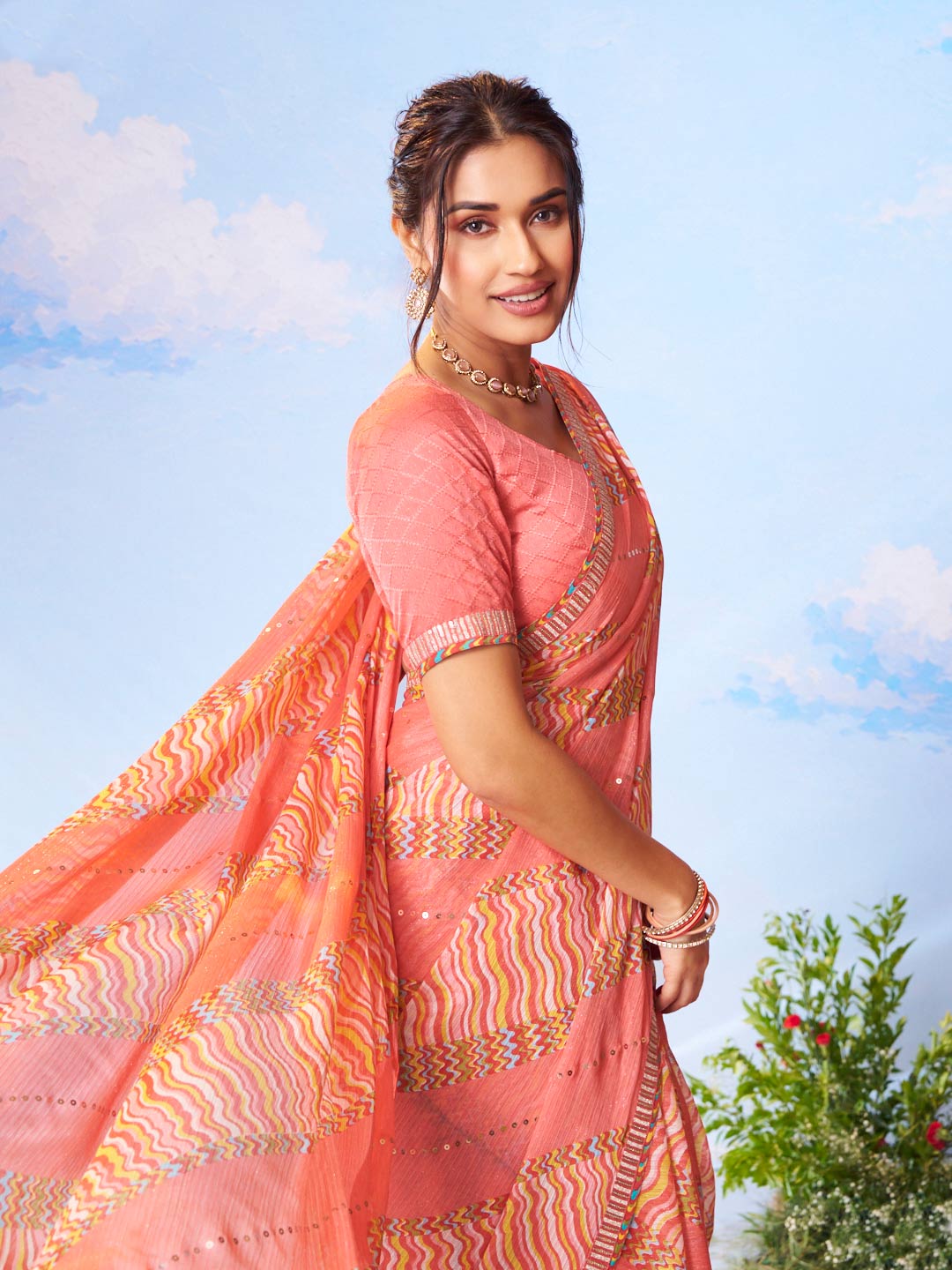 Orange embroidered chiffon saree wedding wear