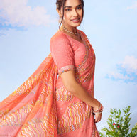 Orange embroidered chiffon saree wedding wear