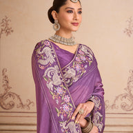 Purple floral embroidered silk blend saree wedding wear