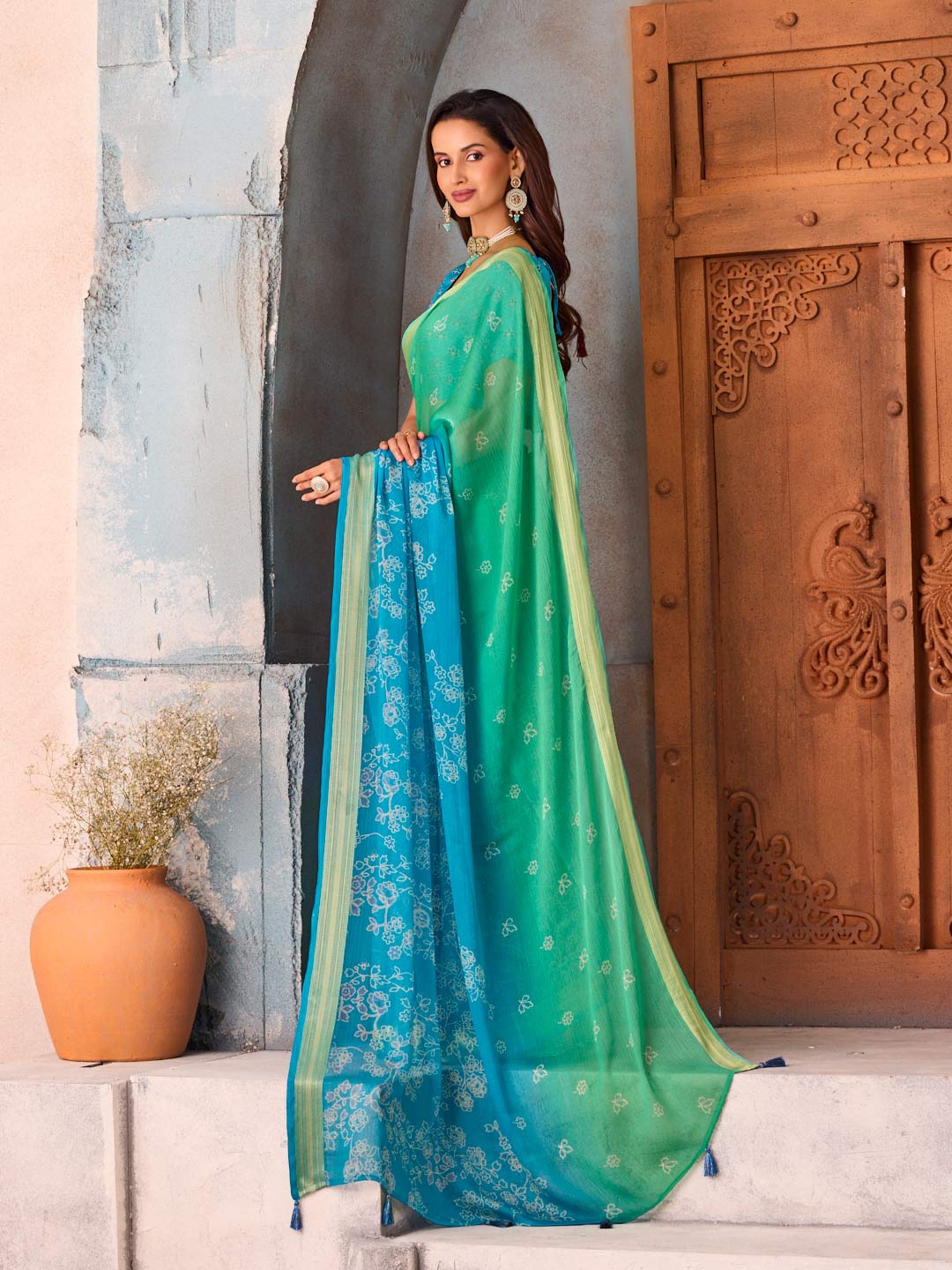 Blue floral printed chiffon saree festive wear