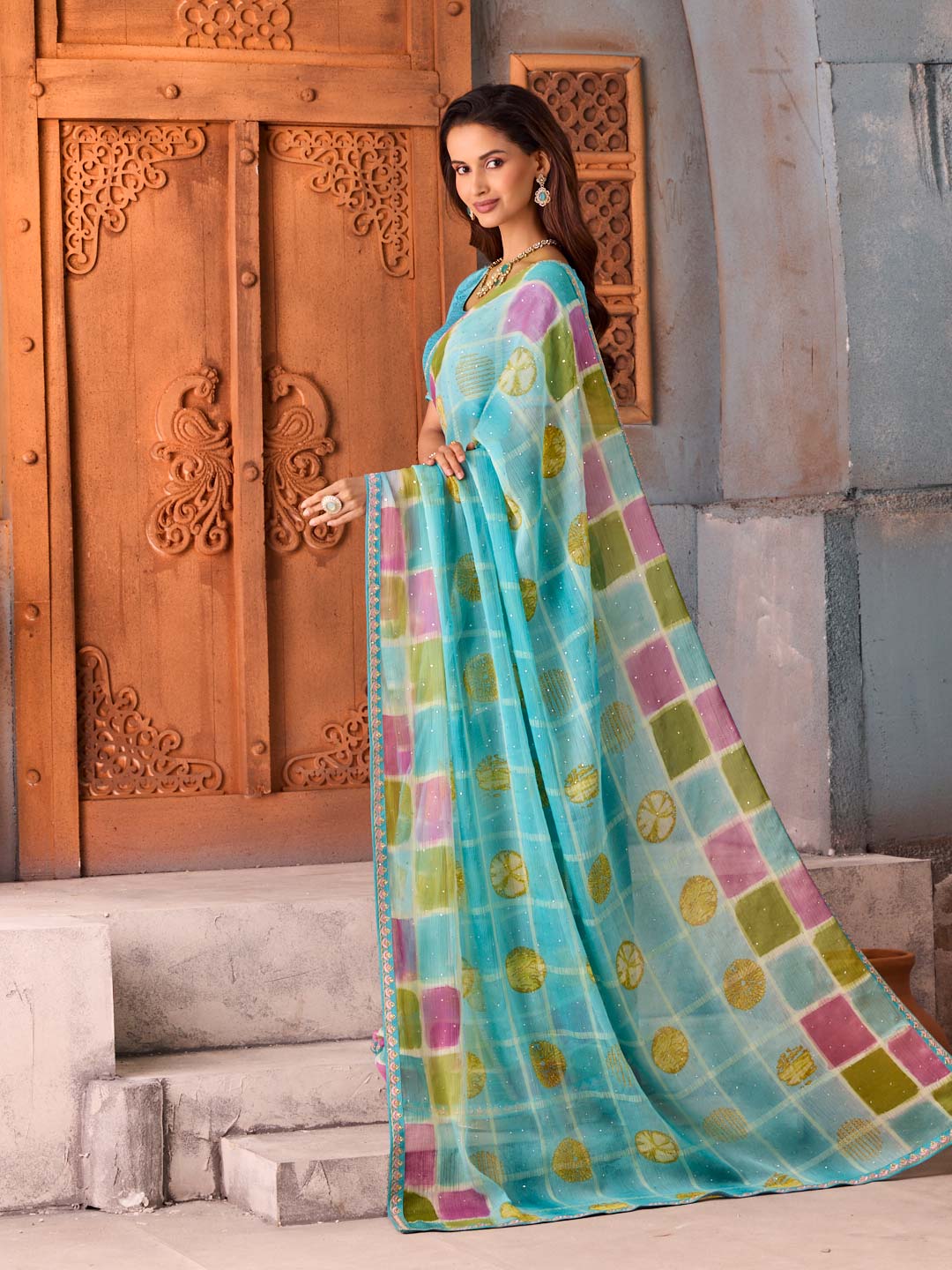 Blue sequined chiffon saree party wear