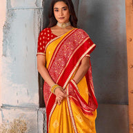 Mustard bandhani printed silk blend saree party wear