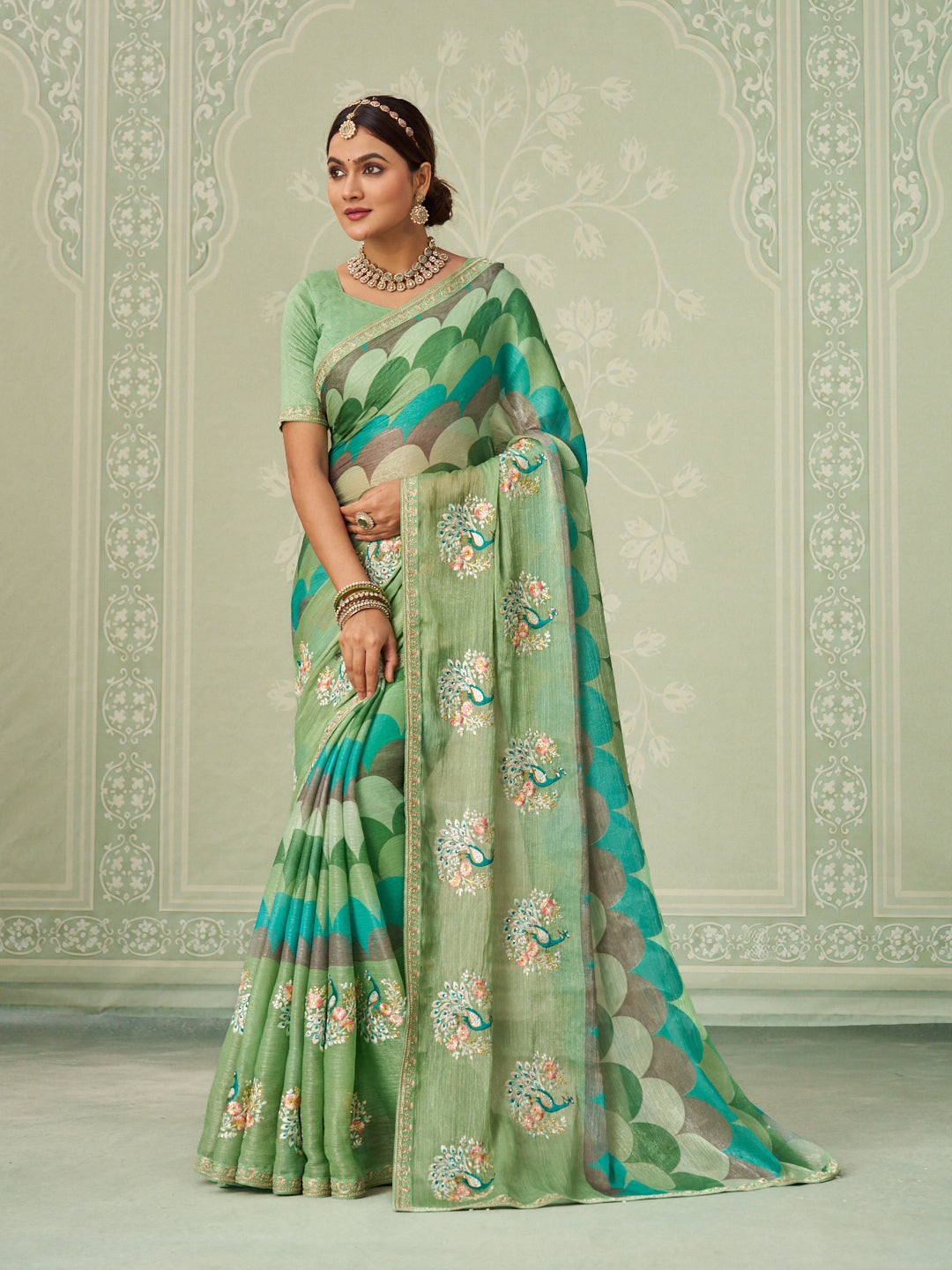 Green embroidered chiffon saree festive wear