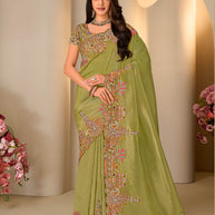 Green embroidered silk blend saree wedding wear