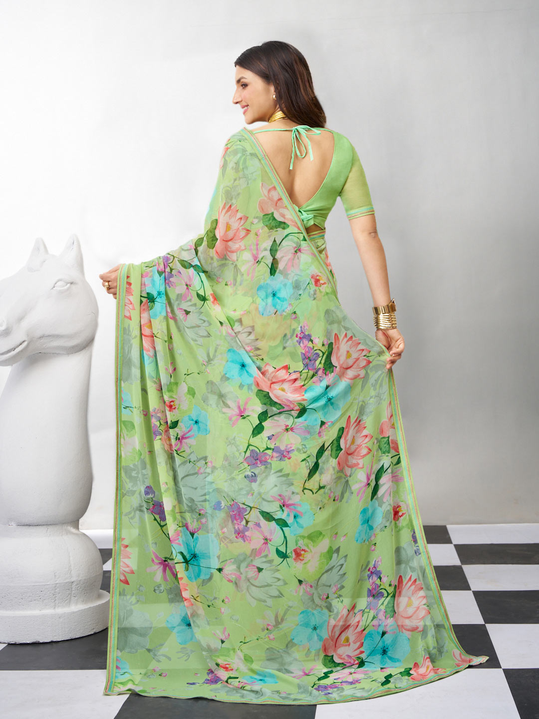 Green trendy floral saree