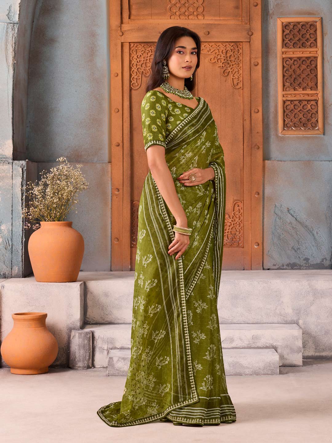 Green floral printed chiffon saree festive wear