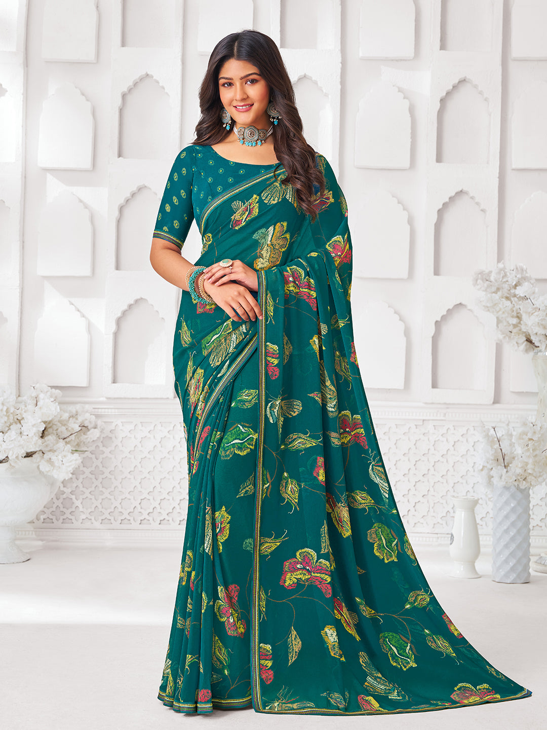 Laxmipati Kamya Teal Green Georgette Floral Printed Saree