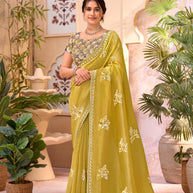 Yellow embroidered chiffon saree party wear