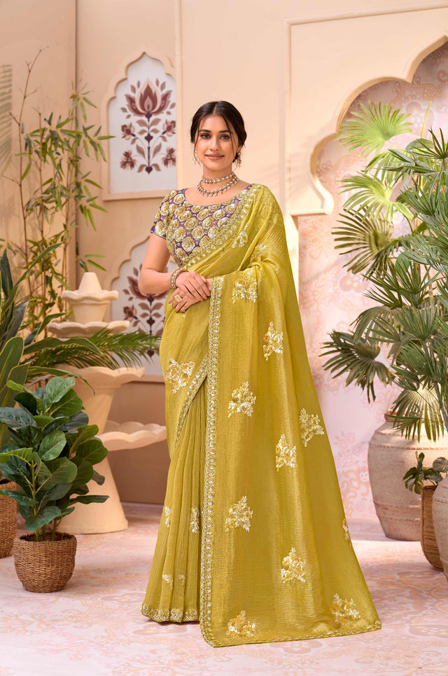 Yellow embroidered chiffon saree party wear