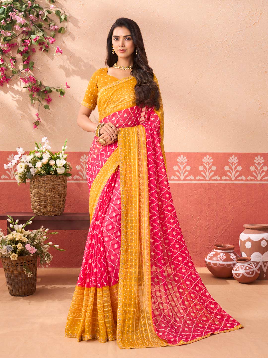 Pink geometric printed chiffon saree festive wear