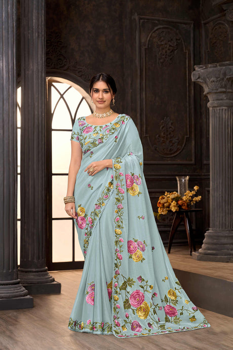 Blue embroidered tissue organza saree festive wear