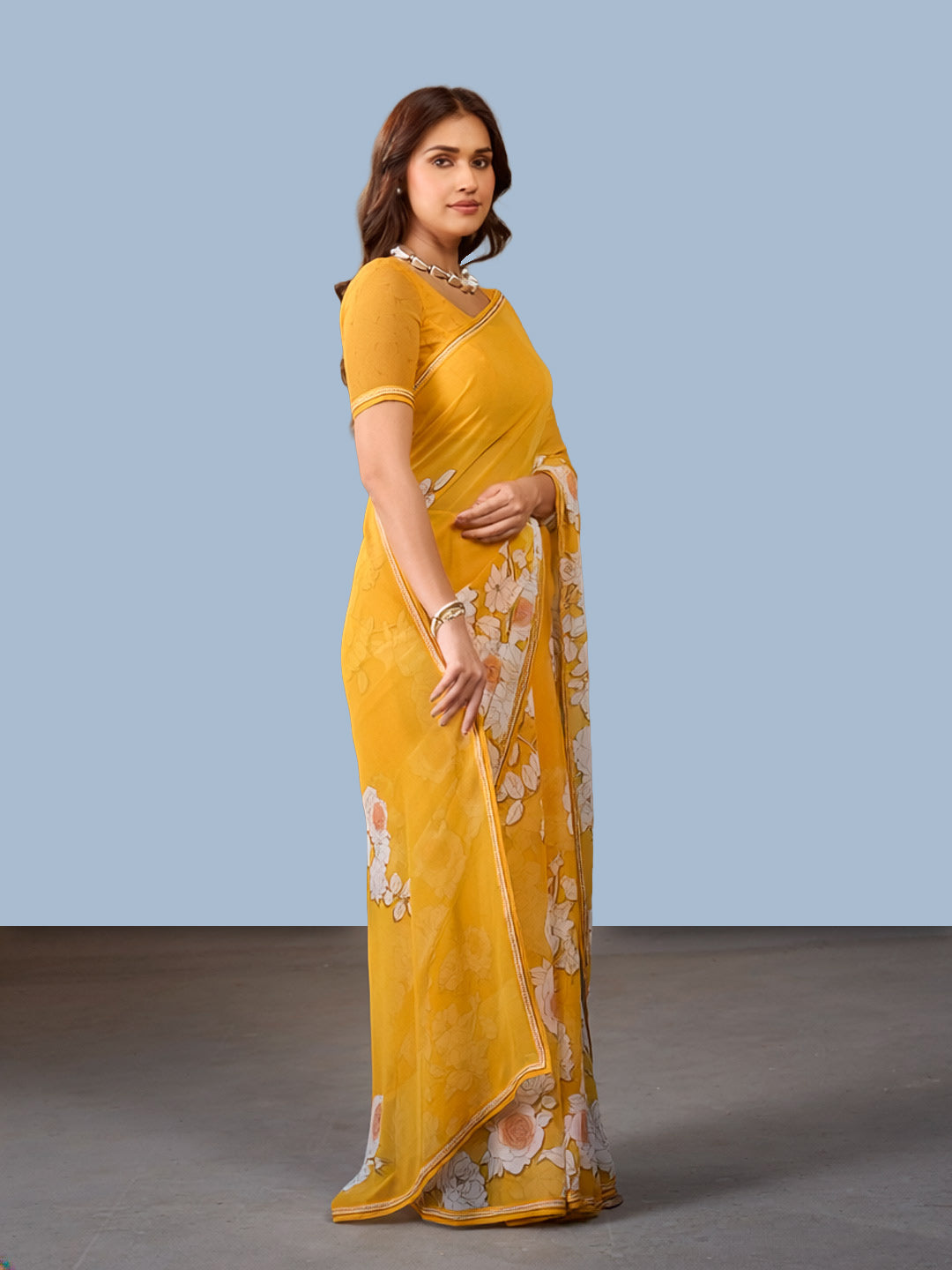 Laxmipati Rudramala Yellow Georgette Floral Printed Saree
