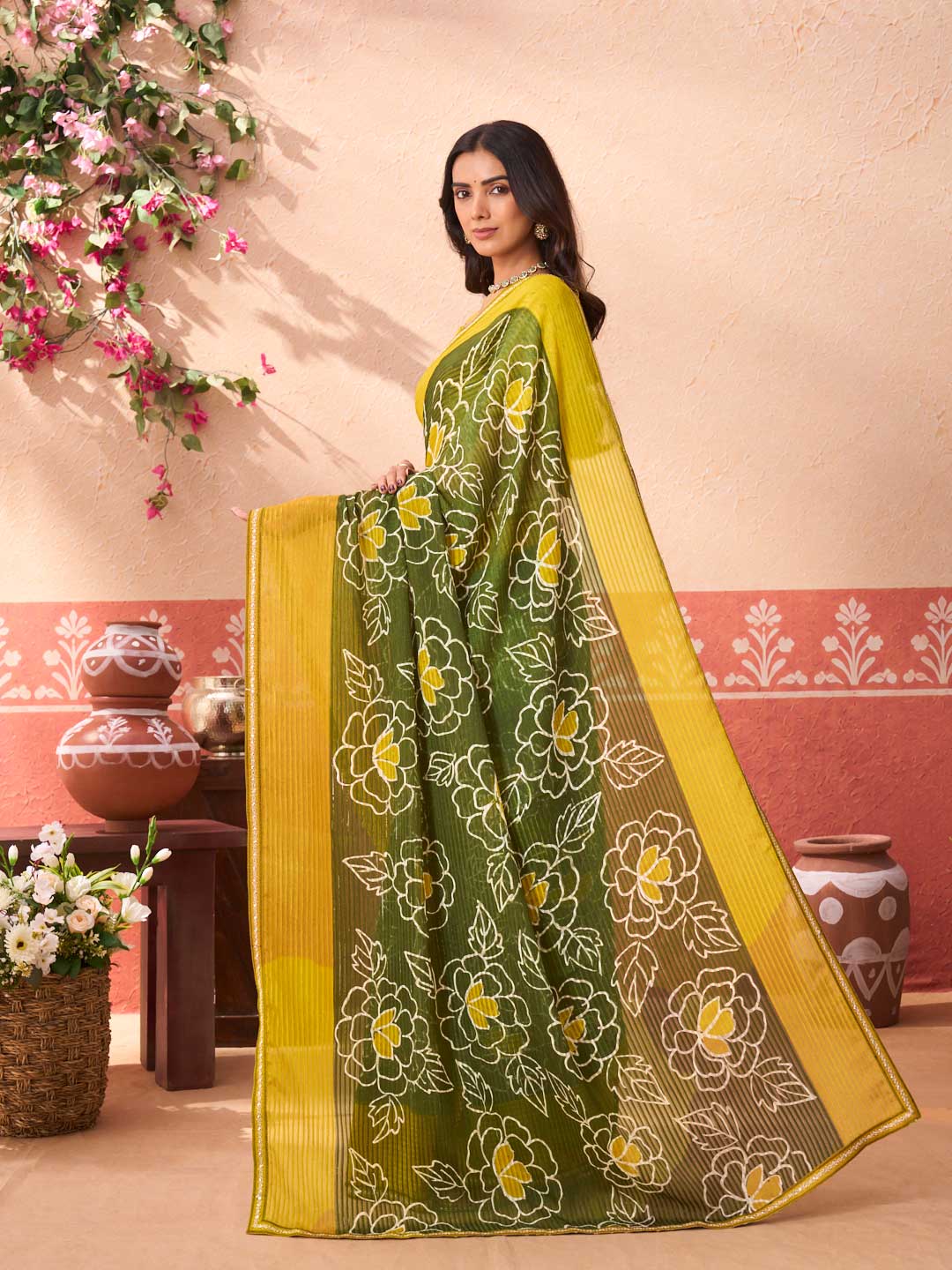 Green floral printed chiffon saree festive wear
