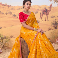 Orange bandhani printed georgette saree wedding wear