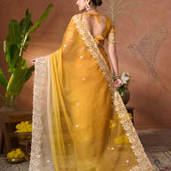 Mustard floral embroidered tissue organza saree party wear