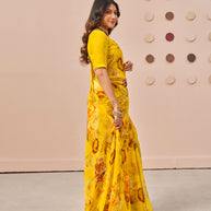 Mustard floral printed georgette saree festive wear