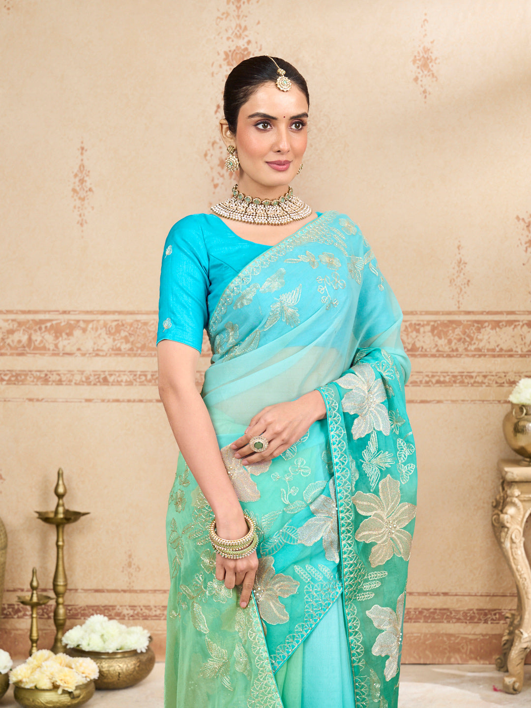 Green embroidered tissue organza saree casual wear