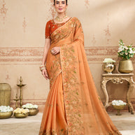 Orange floral embroidered silk blend saree festive wear