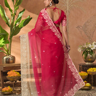 Pink embroidered tissue organza saree festive wear