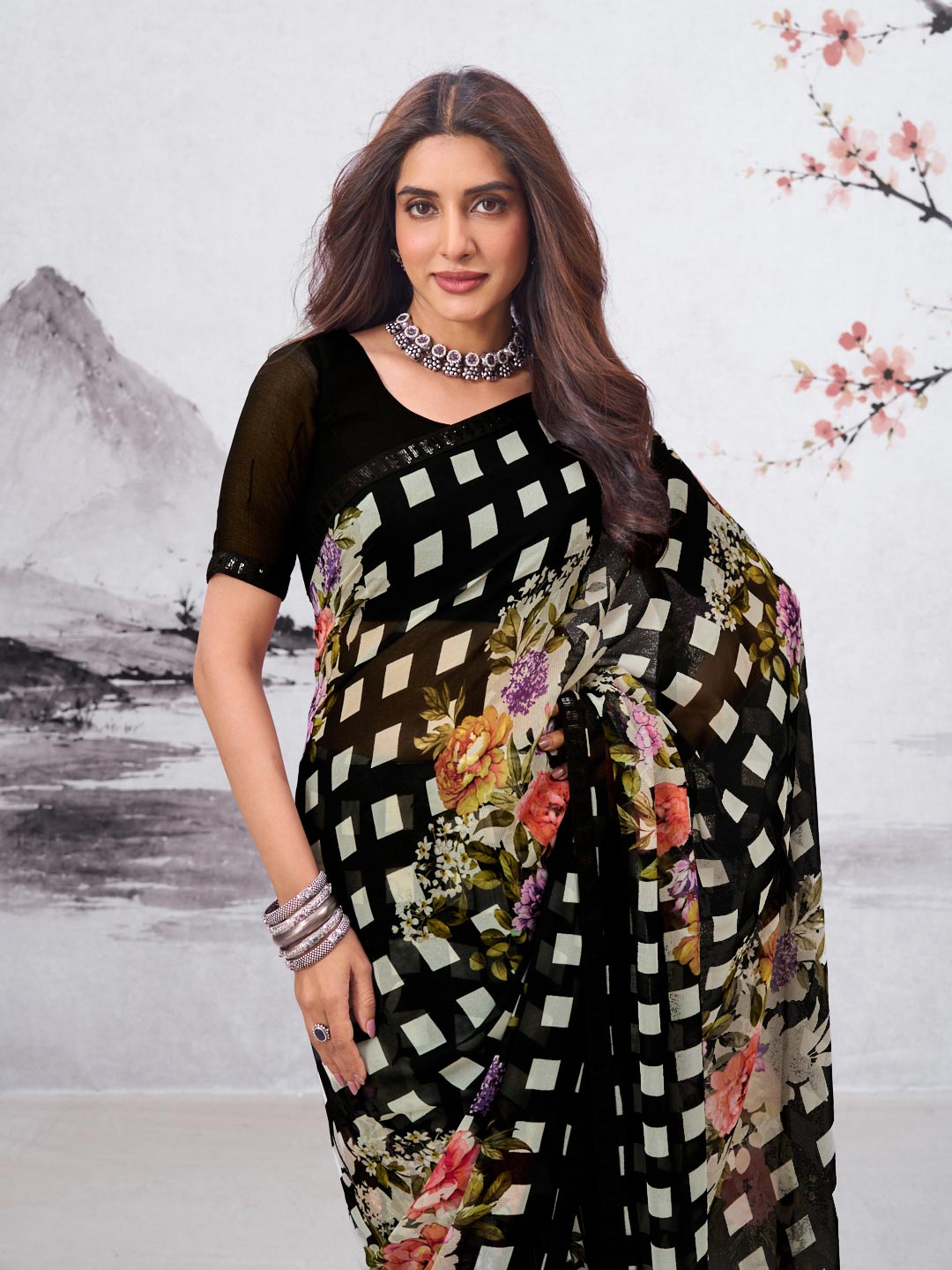 Black floral printed georgette saree wedding wear