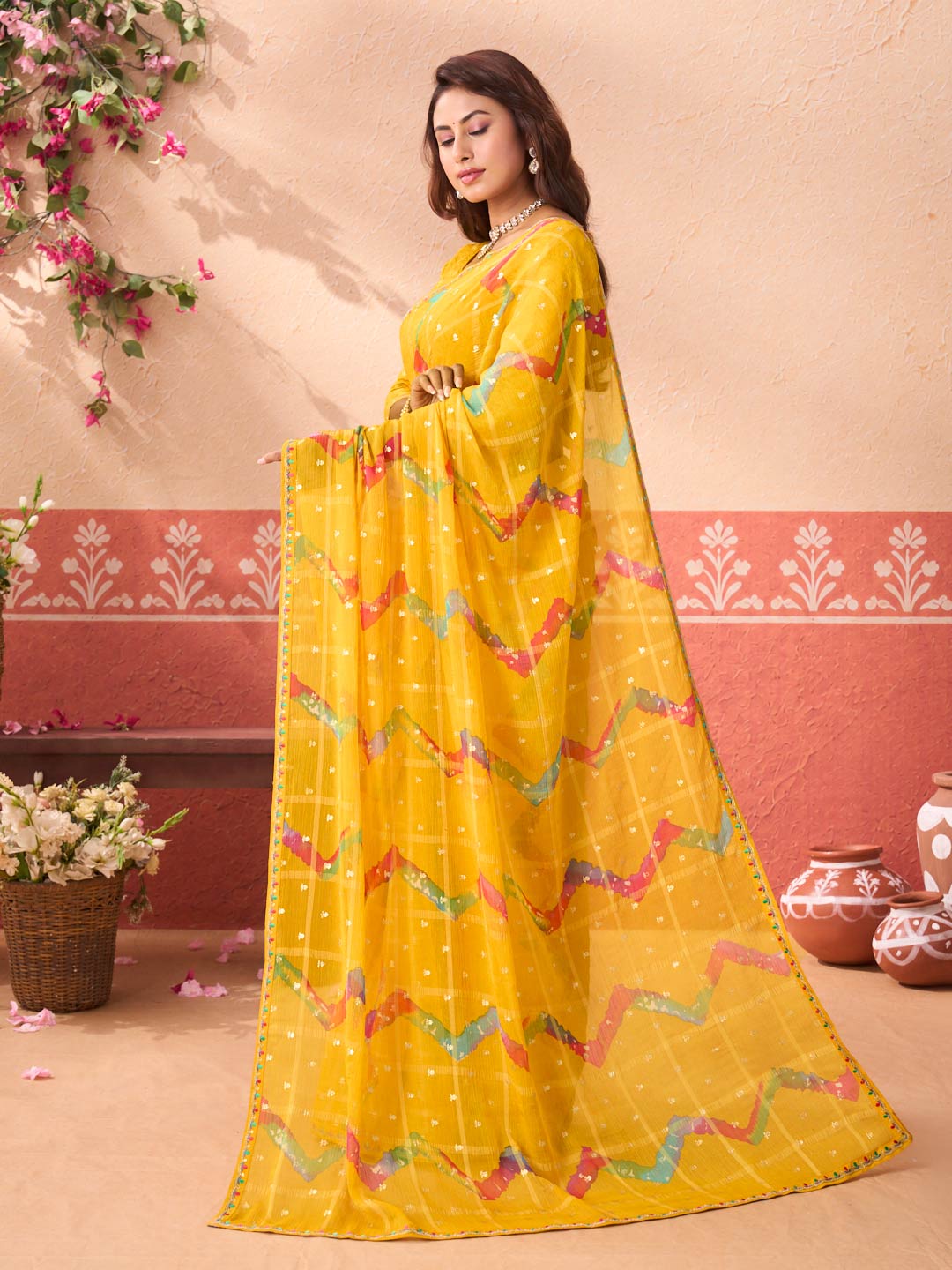 Yellow geometric printed chiffon saree festive wear
