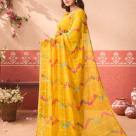 Yellow geometric printed chiffon saree festive wear