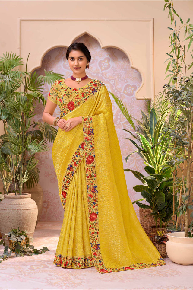 Yellow embroidered chiffon saree party wear