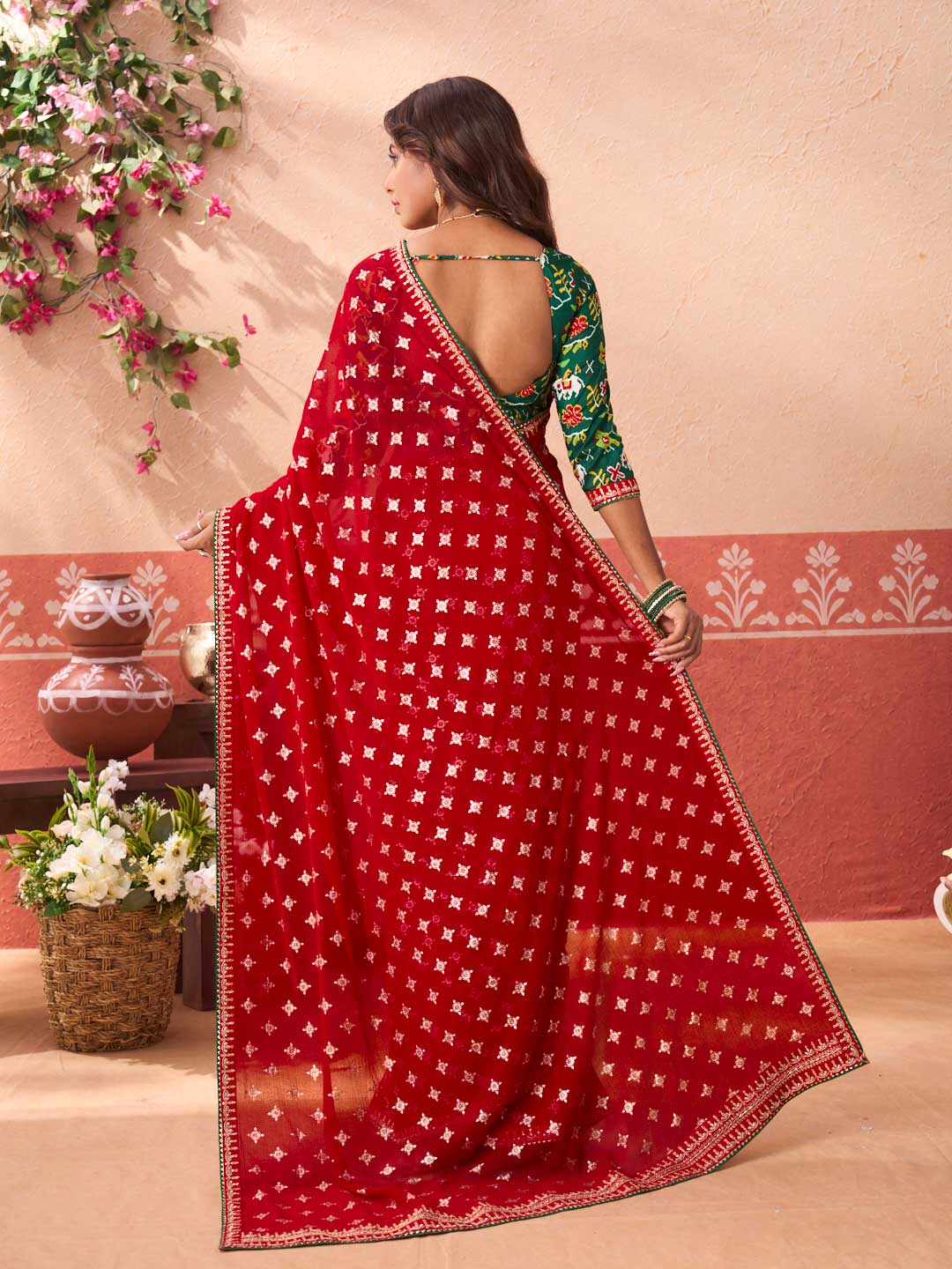 Red printed georgette saree party wear