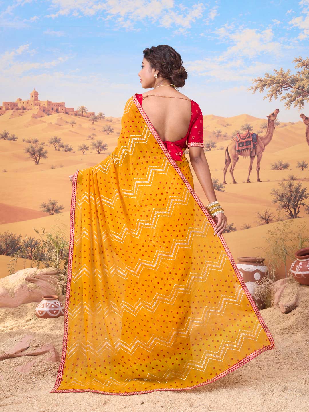 Orange bandhani printed georgette saree festive wear