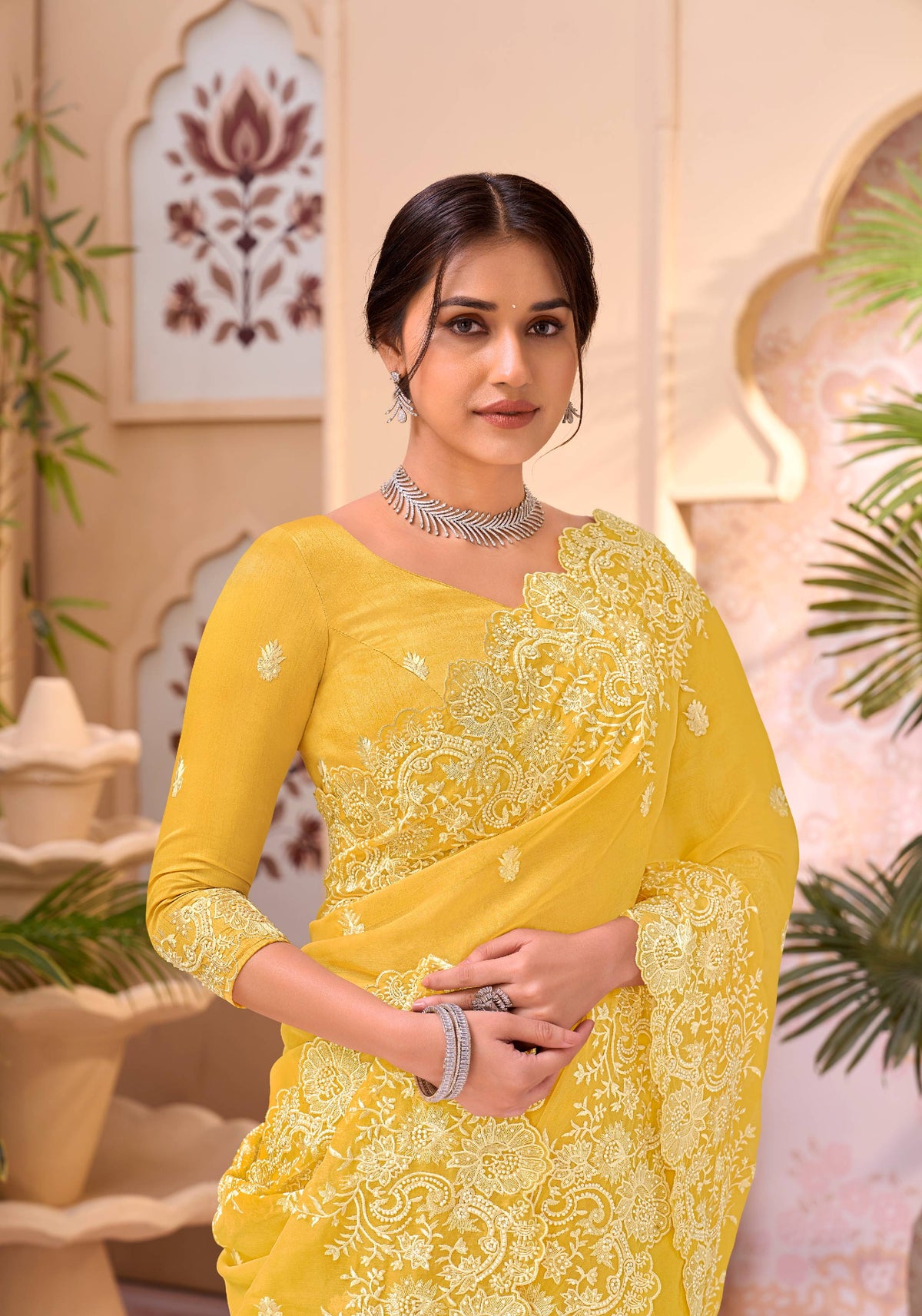Yellow embroidered chiffon saree festive wear