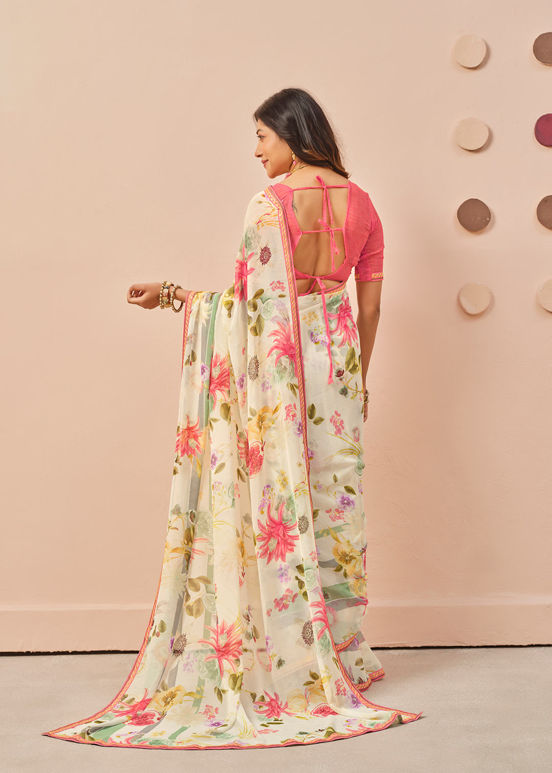 Cream printed georgette saree casual wear