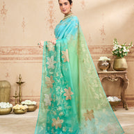 Green embroidered tissue organza saree wedding wear