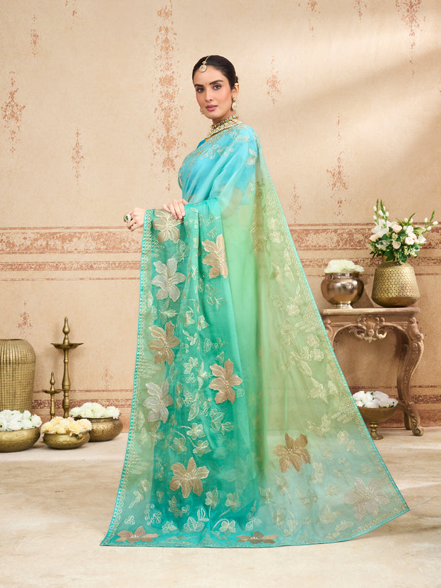 Green embroidered tissue organza saree wedding wear