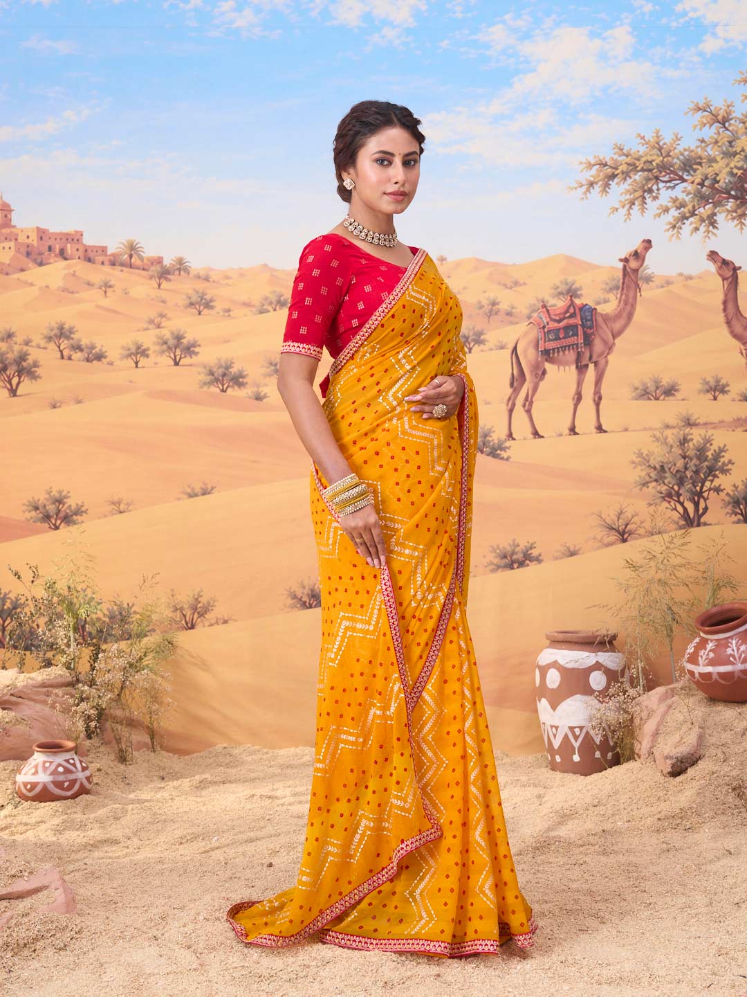 Orange bandhani printed georgette saree casual wear