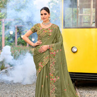 Green embroidered chiffon saree festive wear