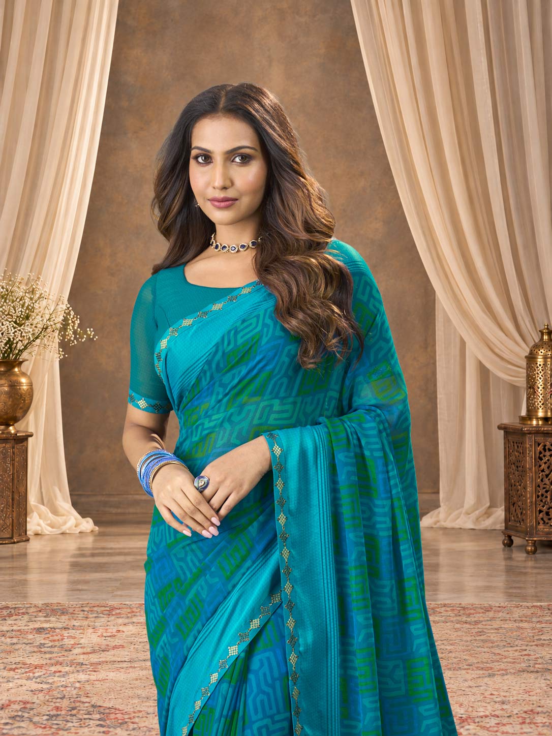 Blue printed georgette saree wedding wear