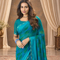 Blue printed georgette saree wedding wear
