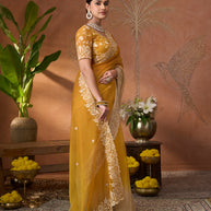 Mustard floral embroidered tissue organza saree wedding wear