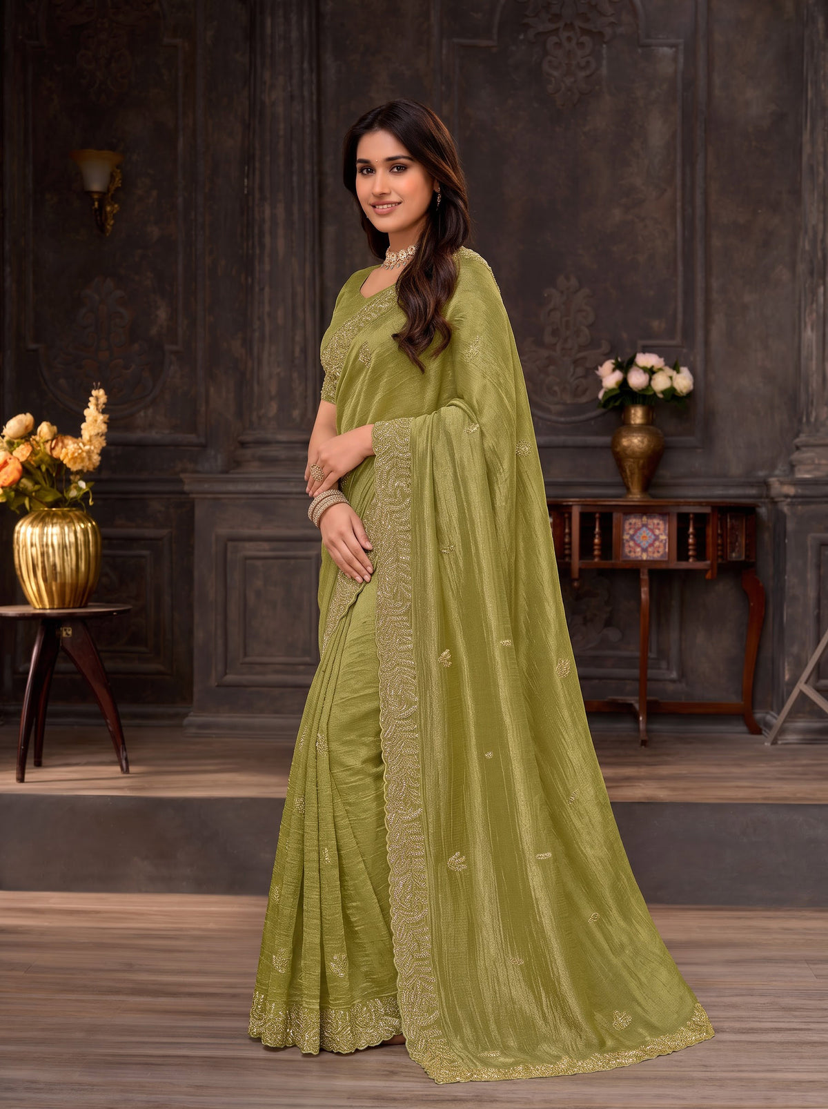 Green embroidered chiffon saree casual wear