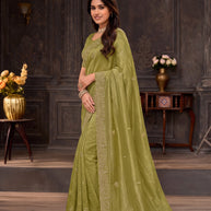 Green embroidered chiffon saree casual wear