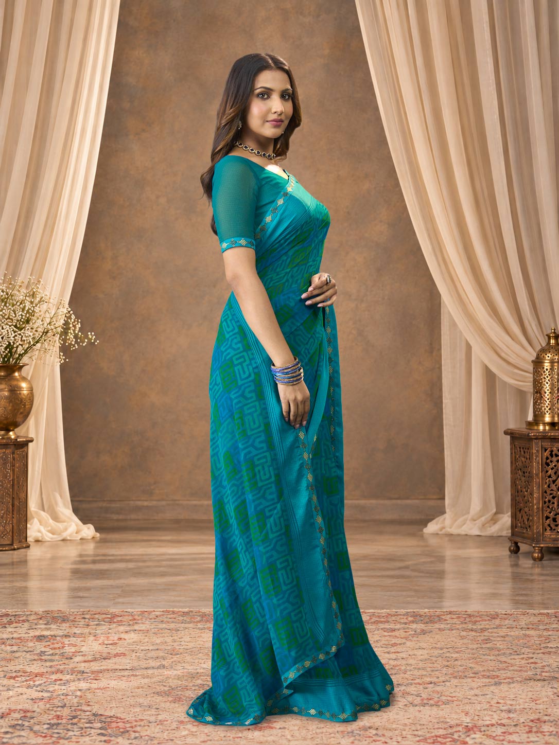 Blue printed georgette saree casual wear
