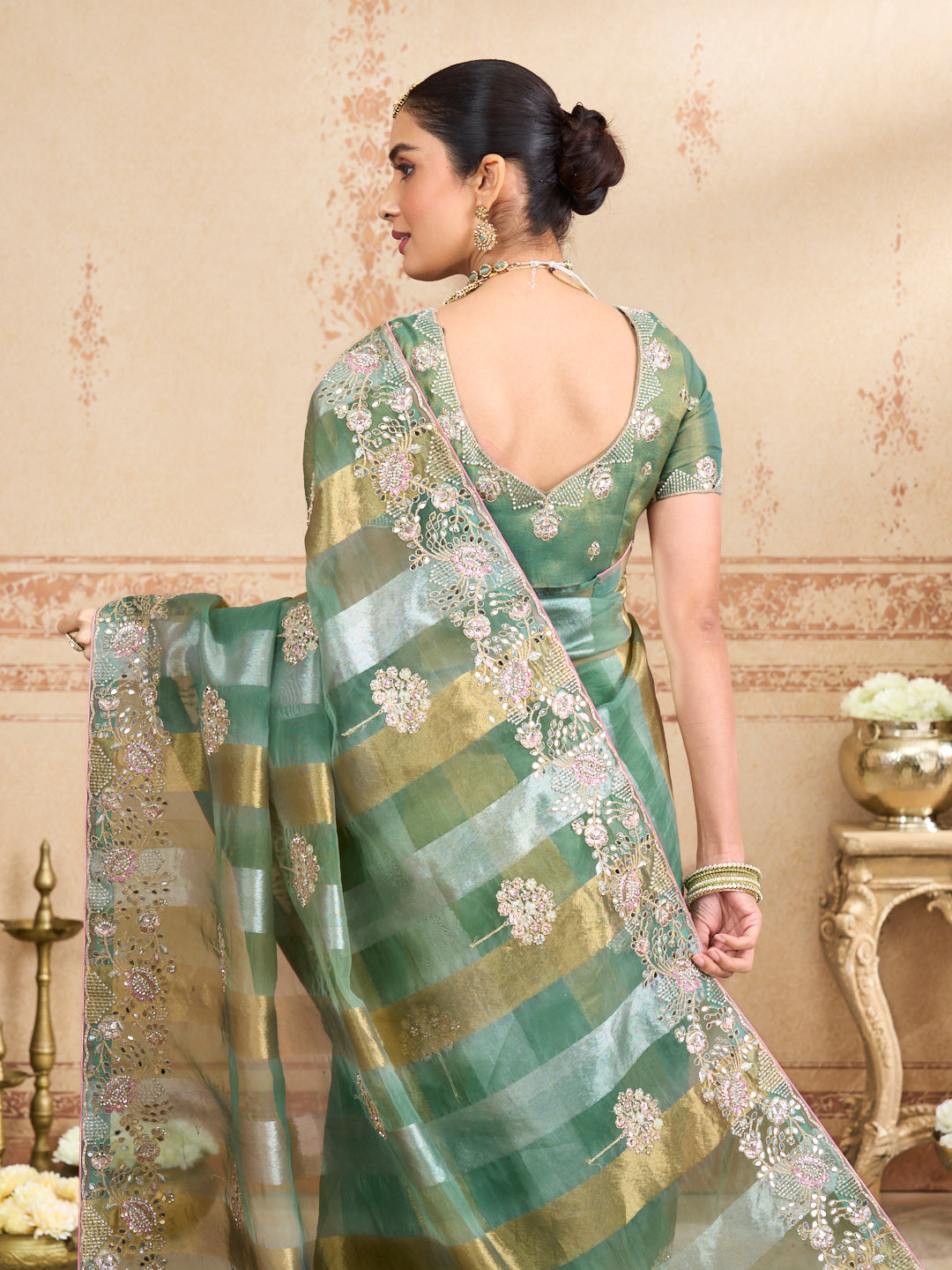 Green embroidered tissue organza saree casual wear