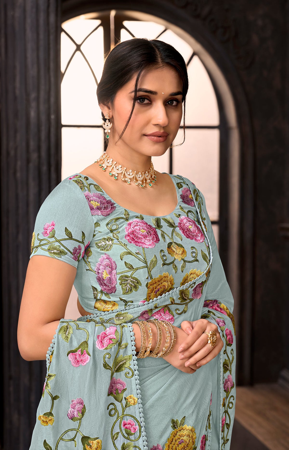Blue embroidered tissue organza saree party wear