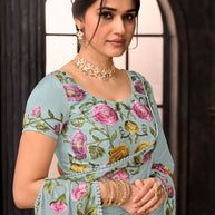 Blue embroidered tissue organza saree party wear