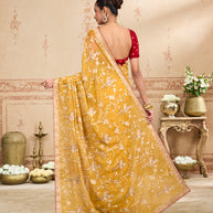 Mustard embroidered tissue organza saree party wear
